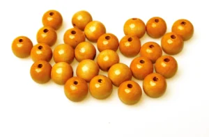 Zak met 100 houten Bouhon parels van 18 mm diameter