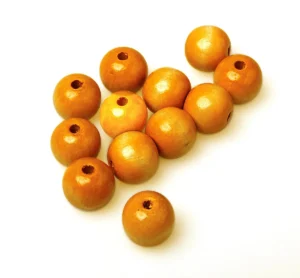 Zakje met 100 houten parels van Bouhon, diameter 24 mm